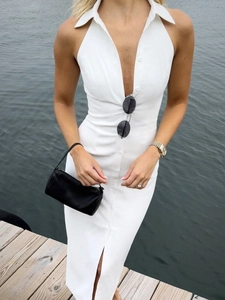 Elegant white sleeveless slit dress with collar and button detail for summer fashion