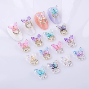 3D laser butterfly nail charms set with crystal rhinestones on minimalist background