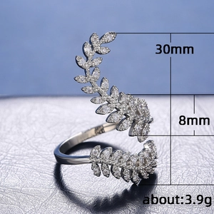 Elegant silver leaf ring with sparkling zircons and open wrap design for women