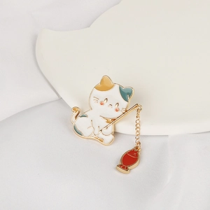 Cute Japanese style enamel cat fishing brooch pin with a dangling red fish charm