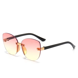 Kids irregular rimless sunglasses with pink-yellow gradient lenses and gold bridge