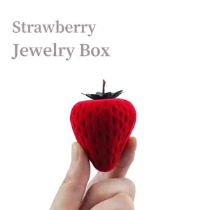 Handheld red flocked strawberry jewelry box for rings and small earrings display