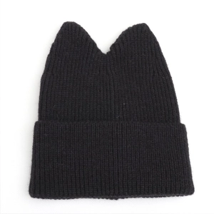 Close-up of black ribbed knit beanie with cute cat ears and wide folded brim detail