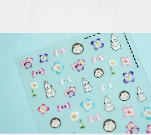 Detailed view of 5D Japanese cartoon nail stickers with rabbit and floral motifs