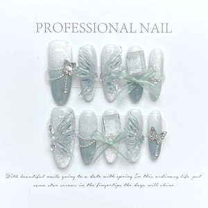 Handmade gradient blue ice cat eye press-on nails with 3D butterflies and pearls