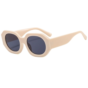 Beige angular geometric sunglasses with grey lenses in a retro 45-degree profile view