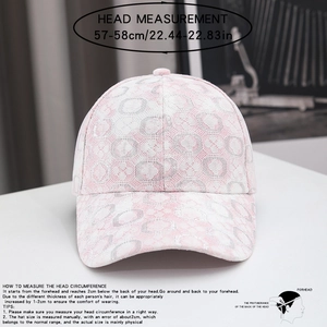 Close-up view of pink lace breathable baseball cap with head size measurement guide