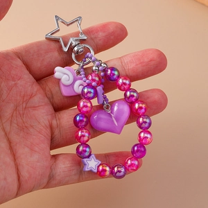 Fashionable purple beaded heart keychain with star-shaped clasp for trendy backpacks