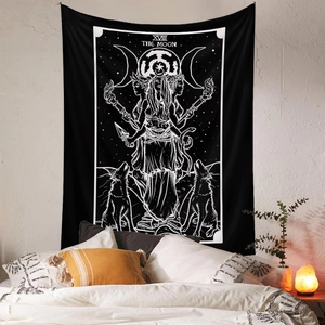 Detail view of Moon Tarot tapestry with black and white mystic elements in cozy bedroom