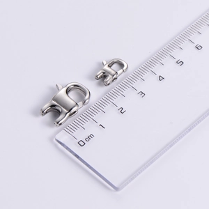 Polished silver stainless steel lobster clasps in two sizes with a metric ruler measurement