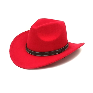 Detail of red wool cowboy hat showing brown leather band and ornate metal buckle