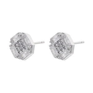 Macro view of silver geometric hexagon stud earrings with cluster diamond setting