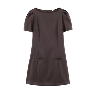 Detailed close-up of dark coffee puff sleeve mini dress with a size label on round neck