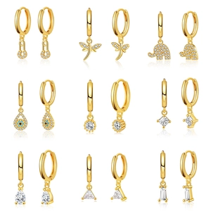 Set of 9 pairs of 18K gold plated copper hoop earrings with animal and geometric pendants