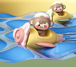 Detail of cute monkey cartoon figures sitting in small colorful toy airplanes on blue waves