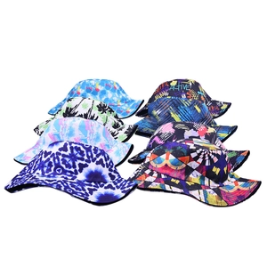 Detail showcasing assorted bucket hats with tie-dye, leopard prints, and tropical patterns