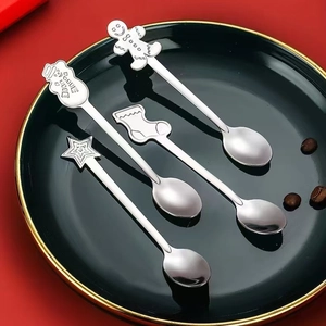 Set of 4 stainless steel Christmas spoons with gingerbread man and snowman toppers