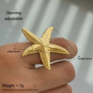 Detailed view of adjustable gold starfish ring showing 40mm width and 36mm height dimensions