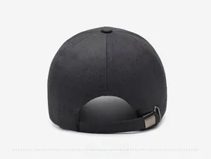 Detail of dark gray baseball cap back showing adjustable metal buckle and textured fabric