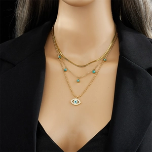 Three-layer gold snake chain necklace with turquoise beads and evil eye pendant for women