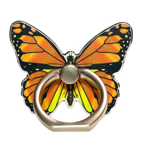 Detail of butterfly phone ring holder featuring monarch pattern and golden metal stand