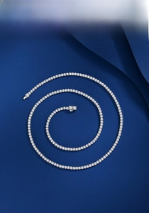 Detailed top view of 2mm silver tennis necklace with sparkling round-cut stones
