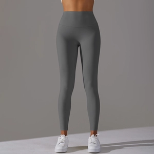 Détail de la taille haute large d'un legging gris foncé avec effet gainant et sport