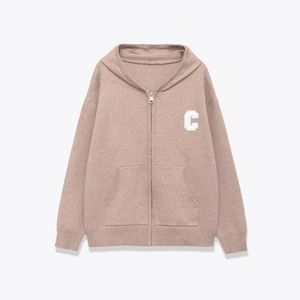 Terracotta knit hoodie with white letter C embroidery and front pockets on grey background