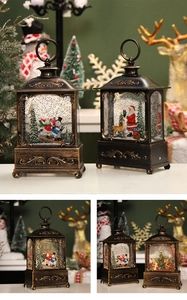 Macro detail of bronze Christmas lanterns with snowmen and swirling glitter