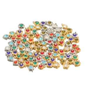 Colorful zircon charms in heart and flower shapes with gold and silver finishes