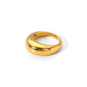 Close-up of a minimalist 18k gold plated stainless steel thick wave ring with glossy finish