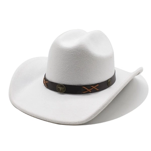 Detail of white felt cowboy hat featuring leather band and vintage bull head metal emblem