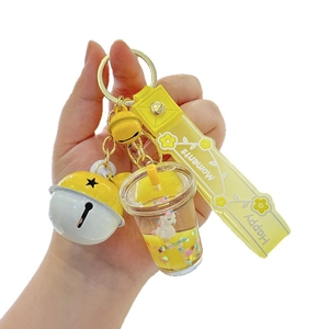 Cute unicorn milk tea keychain with yellow bell and liquid glitter star charm