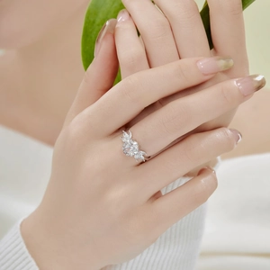 Detailed view of S925 silver ring with 8A ice-cut zircon on a hand model