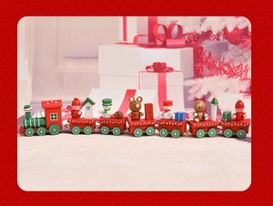 Detailed view of a 7-section red wooden Christmas train with festive figurines on white box