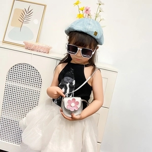 Cute girl's silver crossbody bag with pink sequin flower and stylish kids' sunglasses