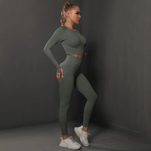 Detailed vertical ribbed texture on sage green seamless yoga set with cropped top