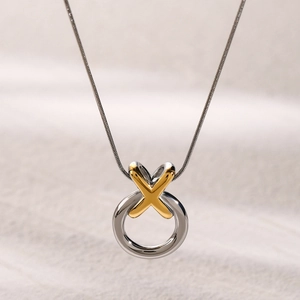 18k gold and silver two-tone stainless steel XO pendant necklace with snake chain