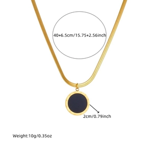 Gold plated stainless steel necklace with Roman numeral round pendant on white background