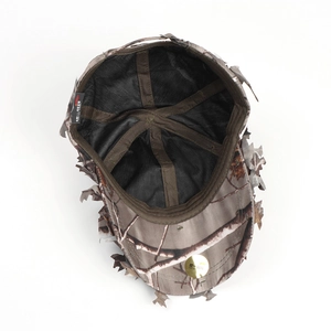 Detail view of 3D leaf camo cap interior with adjustable buckle and breathable lining