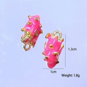 Macro detail of dragon fruit enamel alloy pendants with dimensions and weight info