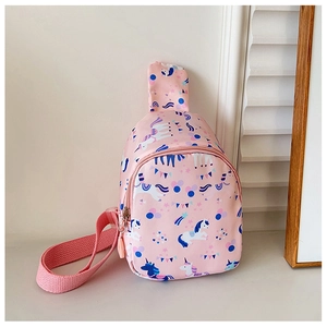 Detailed view of pink kids chest bag featuring cartoon unicorn and star patterns