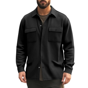 Detail of black fleece-lined jacket with chest pockets and thick knit texture