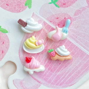 Five mini resin dessert charms including ice cream and cake shapes in pastel colors