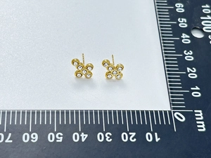 Detailed measurement of 10mm gold cross stud earrings featuring white cubic zirconia