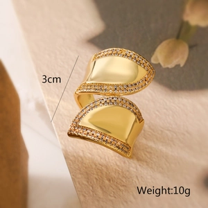 Detail view of gold floral geometric open ring with white zircon stones and 3cm size mark