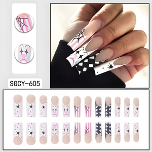 Halloween clown themed press-on nails with spider web and checkerboard patterns
