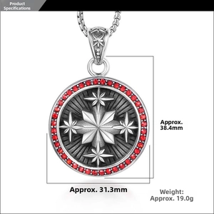 Detail view of silver star pendant with red crystals and dimensions 38.4mm by 31.3mm