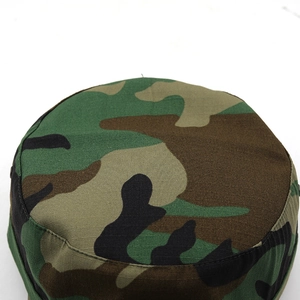 Detail of classic jungle camouflage flat top military cap with reinforced stitching