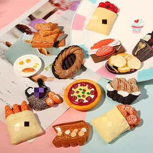 Detailed assortment of resin miniature food magnets including pizza and waffles